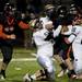 Chelsea defense tackles Tecumseh High School senior quarterback Ben Dreslinski on Friday. Chelsea leads at halftime 17-13. Daniel Brenner I AnnArbor.com